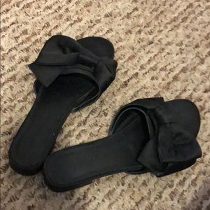 Black bow slippers